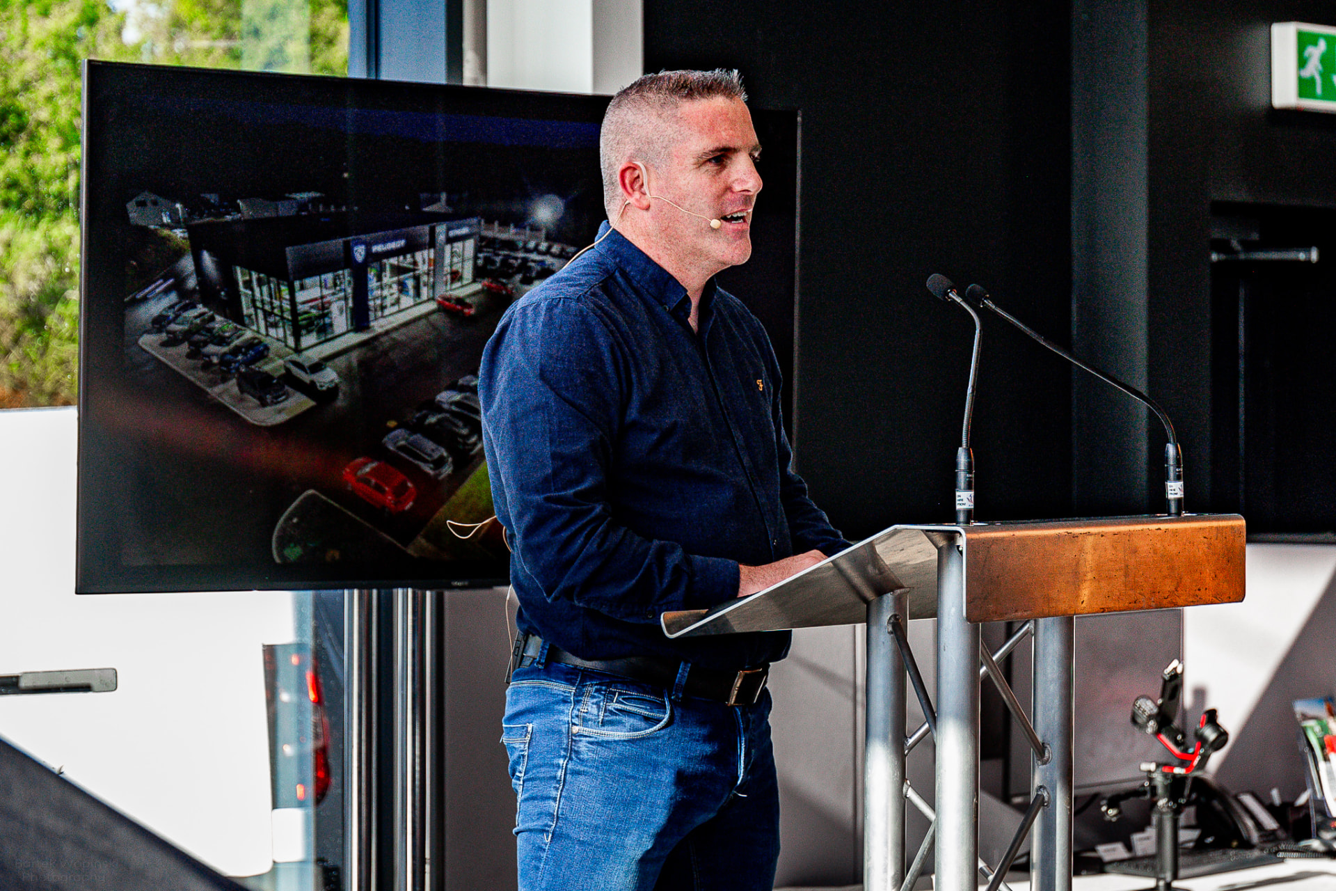 Kevin Egan speaking at a Peugeot event